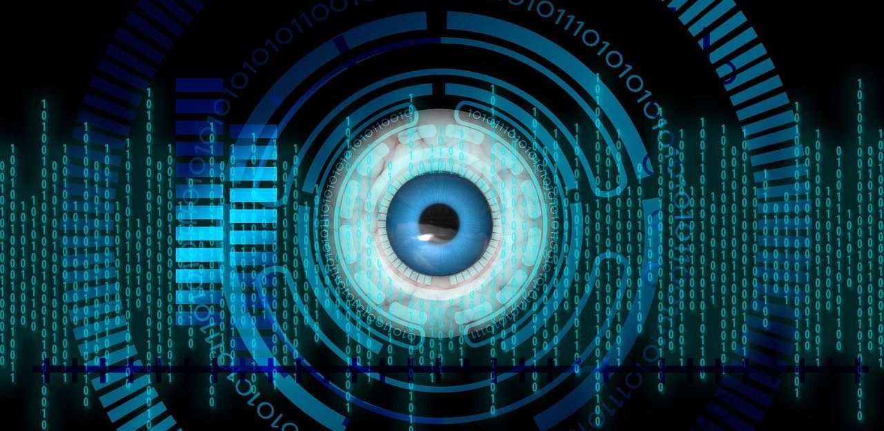 Ein großes Auge und binäre Zahlencodes symbolisieren Künstliche Intelligenz